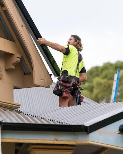A Roof and Render roofer working on a roof