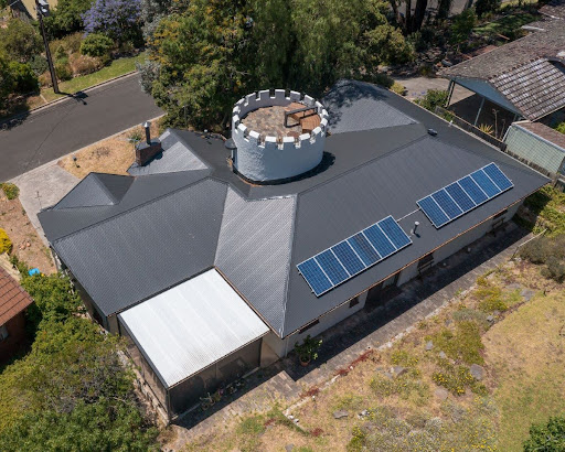 A complete roof replacement done with Colorbond Woodland Grey