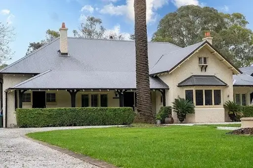 a home in hawthorn with a newly replaced roof made of colorbond in woodland grey.