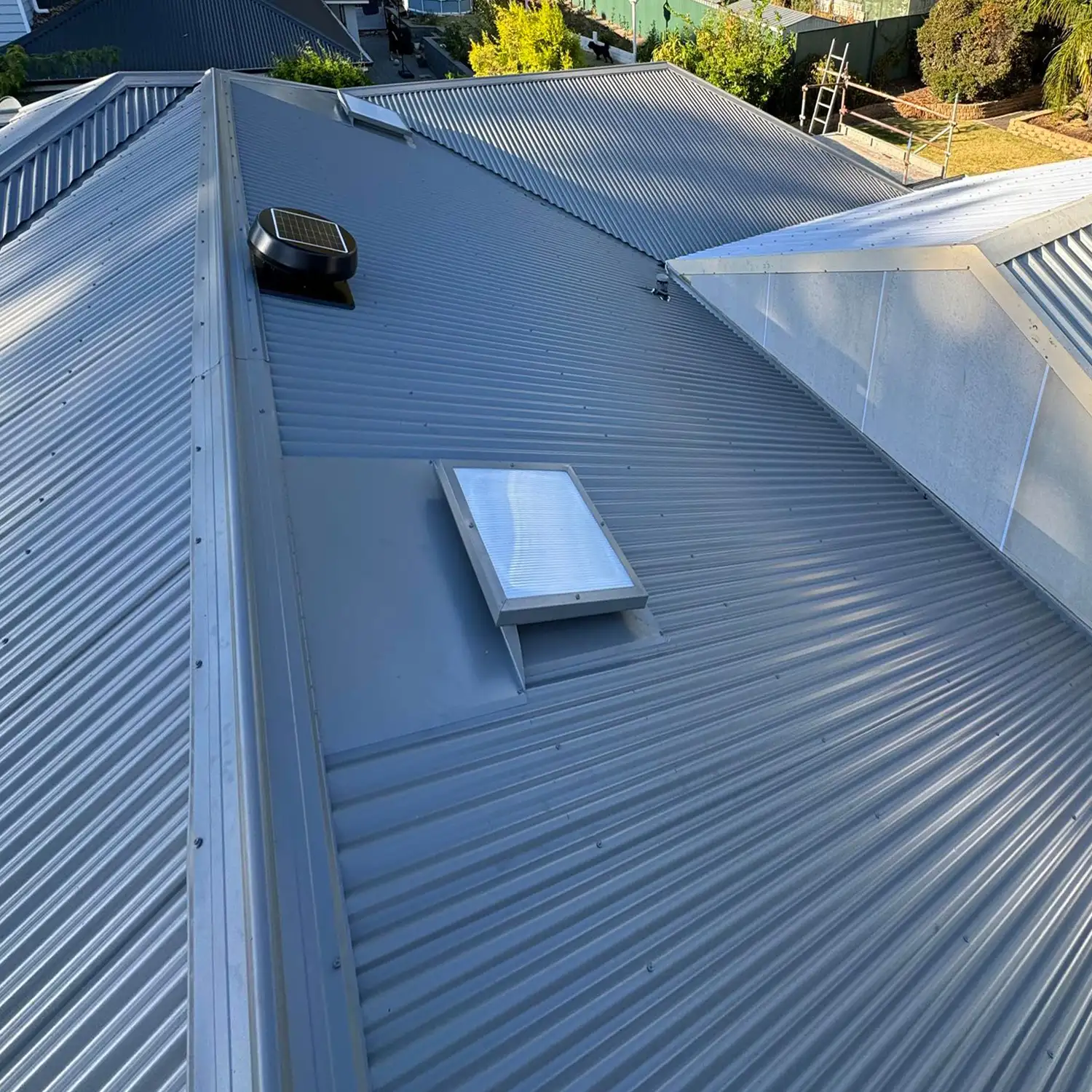 Modern home after roof tile to metal swap